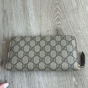 GUCCI SUPREME ZIP AROUND WALLET